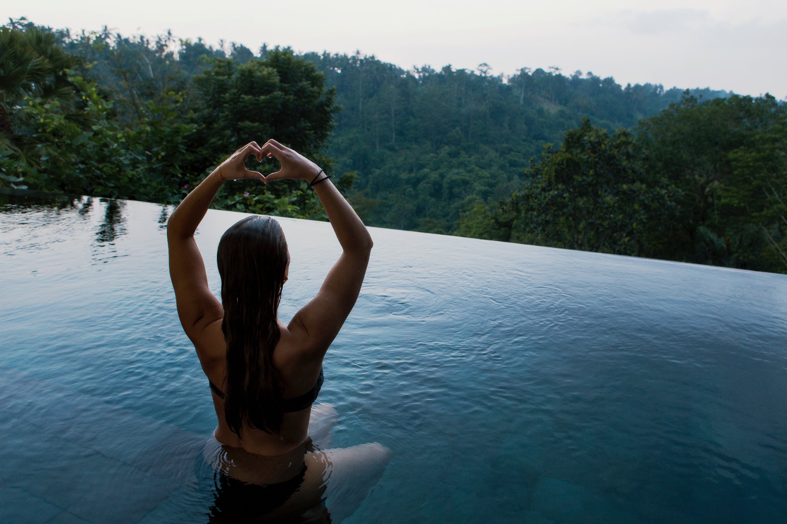 Yoga woman water trees.jpg